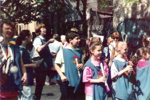 Recorder and glockenspiel players assemble outside St. John's Methodist Church in Ridgewood for the 1992 Anniversary Day Parade.