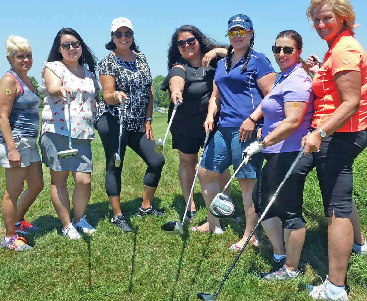 Rotarians take to the links or to the lap of leisure