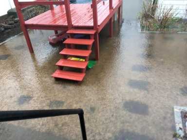 Avella stands with Bayside residents to call for resolution to longstanding flooding