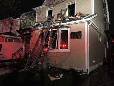 Three people died in a three-alarm fire at this Queens Village home on April 28.