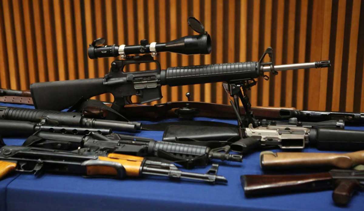 Officers seize 71 guns, including assault rifles, from Oakland Gardens home