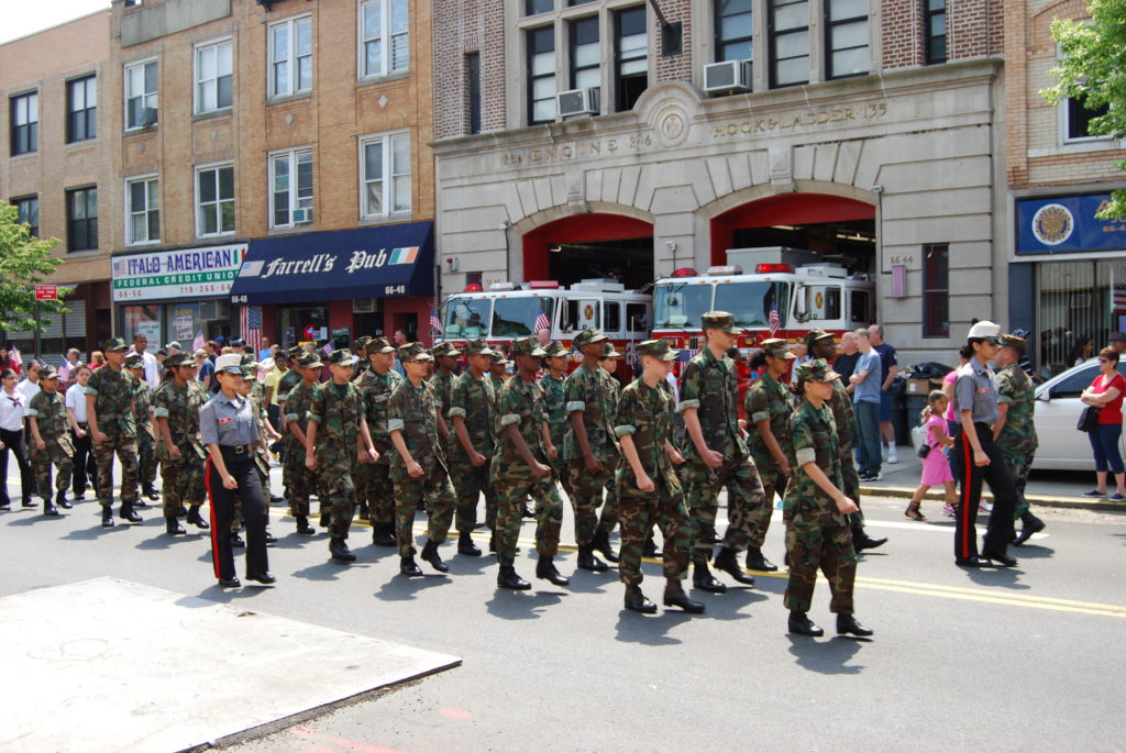 The 2009 parade as it passes in front of the Myrtle Avenue headquarters of Engine Company 286/Ladder Company 135