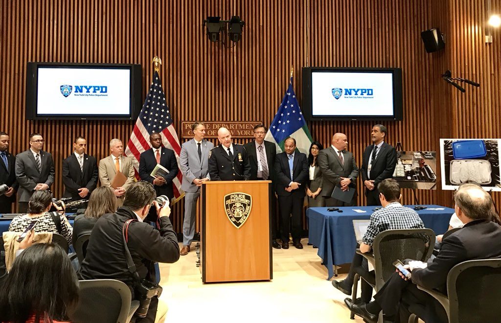 Law enforcement officials at One Police Plaza in Manhattan announce the results of the Queens raids.