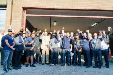 Workers rally for union contract at Two Men and a Truck in Long Island City