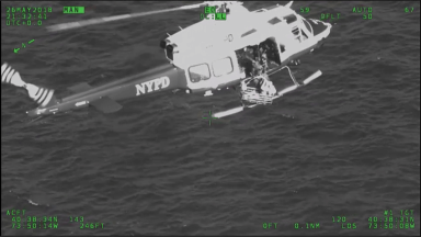 A police helicopter used a rescue basket to pull two kayakers out of Jamaica Bay on Saturday afternoon.