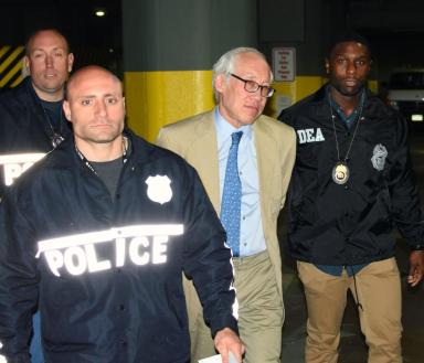 NYPD and DEA agents escort Dr. Lawrence Choy into court on June 7.