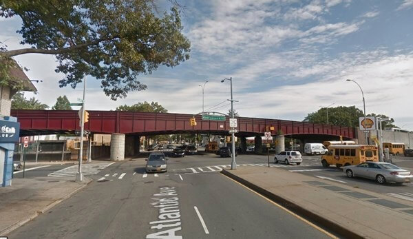 Two suffer minor injuries after car crashes into parked school bus