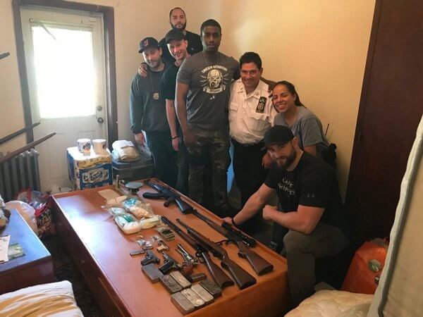 Police find guns, drugs in Forest Hills raid: DA