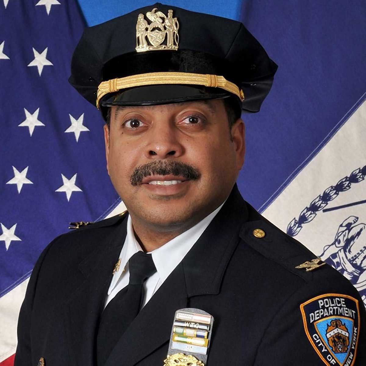 Former inspector honored upon departure from 105th Precinct