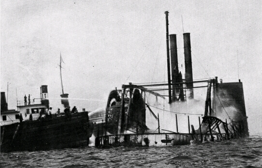 A fireboat attempts to put out the fire aboard the General Slocum on June 15, 1904.