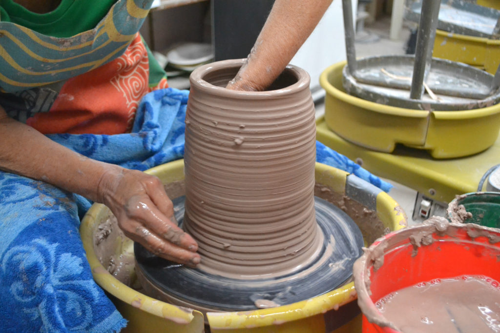 Blunt works on a piece at The Potters Wheel