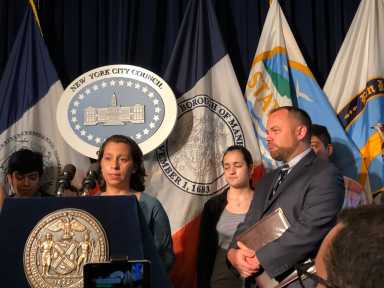 Sandra Chica, wife of Pablo Villavicencio, speaks at a City Hall press conference on July 23, just a day before her husband had been freed from ICE custody.