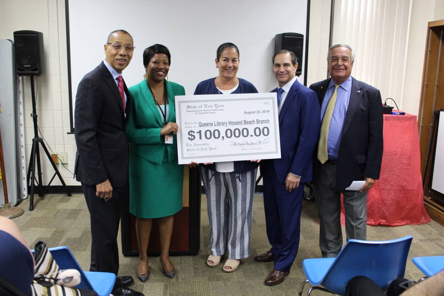 Pheffer Amato presents $100,000 to Queens Library President & CEO Dennis M. Walcott
