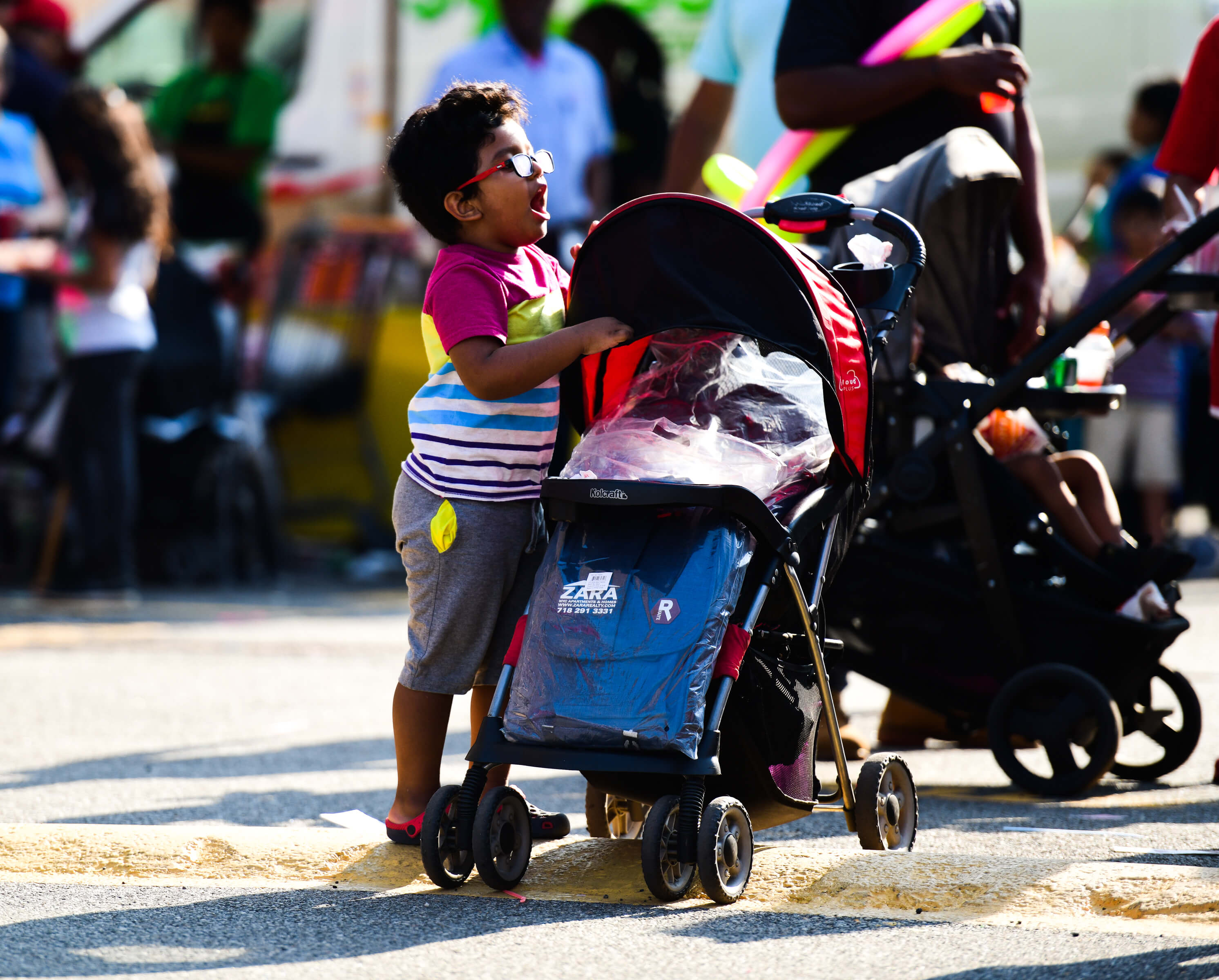 Queens real estate firm hands out backpacks with school supplies to