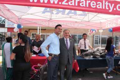 Zara Realty gives away 1,200 backpacks in Jamaica