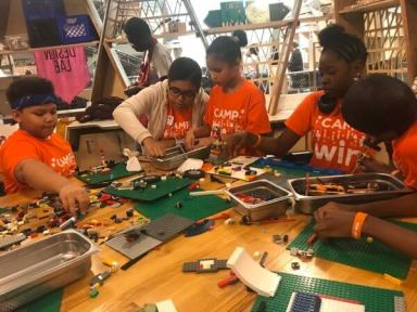 Homeless students participate in STEM-related activities at New York Hall of Science
