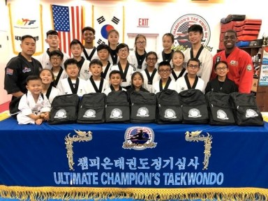 Flushing Taekwondo school to host backpack giveaway