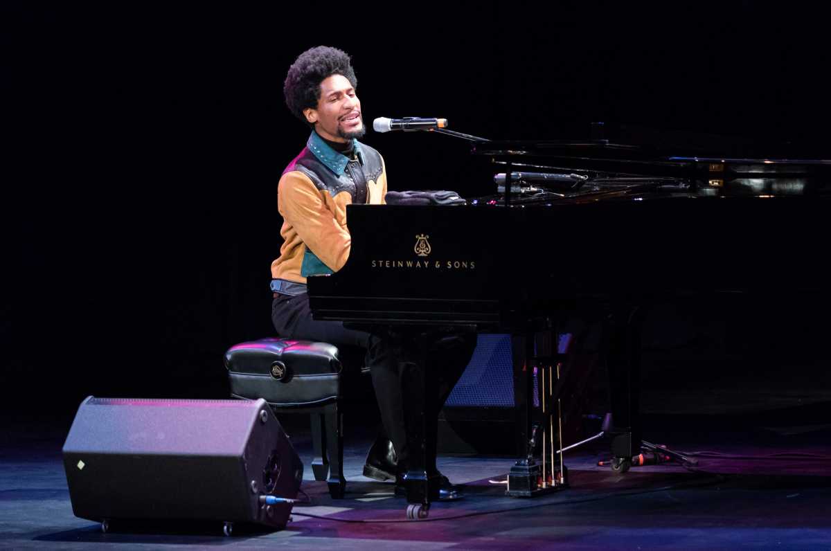 Jon Batiste performing at the Krasnoff Theatre