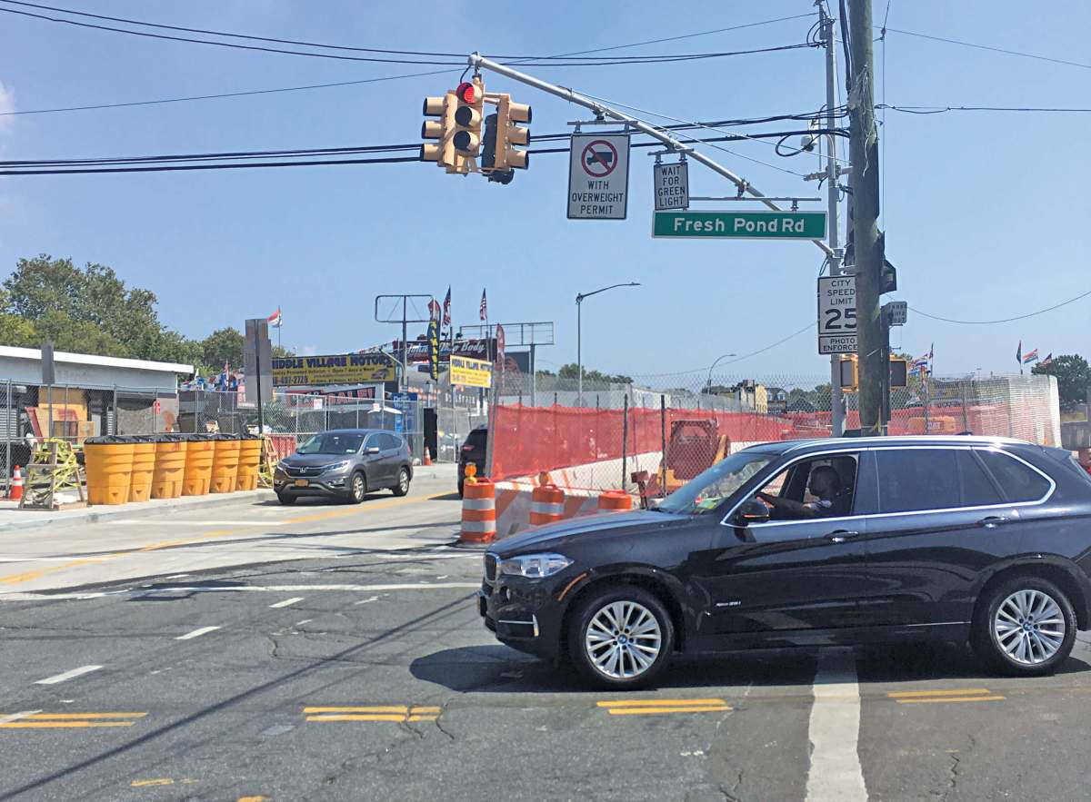 The intersection of Metropolitan Avenue and Fresh Pond Road in September 2018.