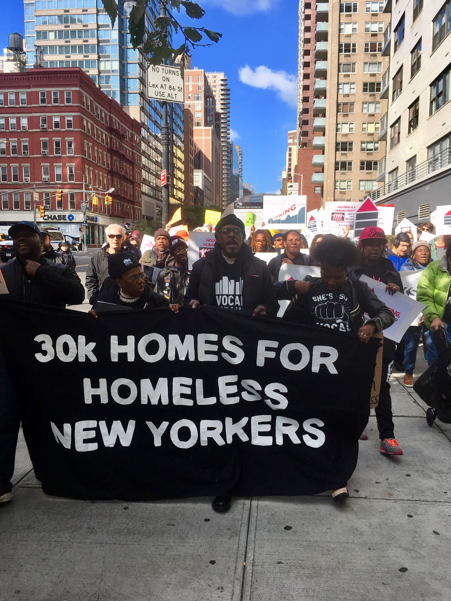Several hundred homeless advocates march on Gracie Mansion to demand more 30,000 permanent units for New Yorkers in the shelter system.