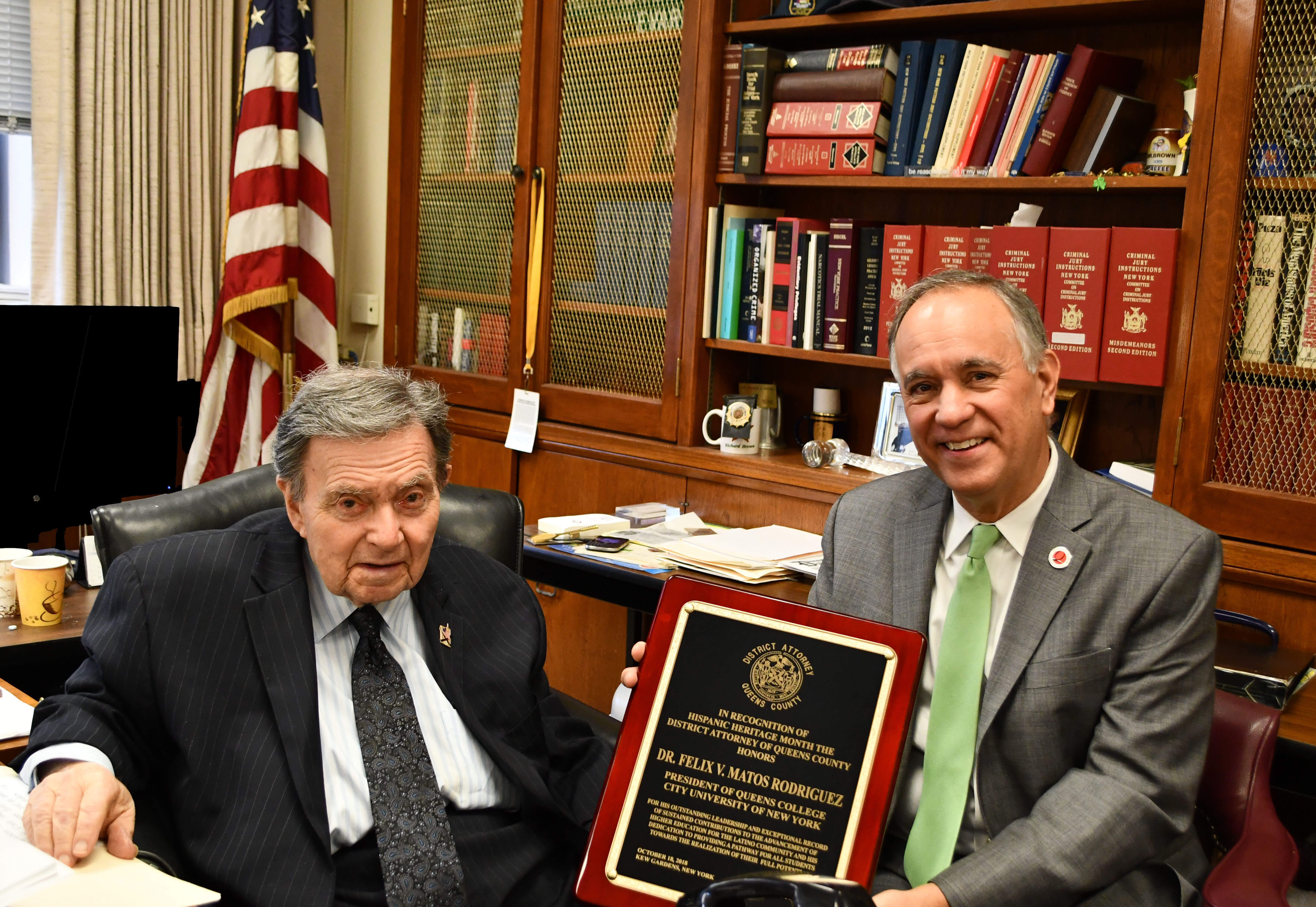Queens District Attorney Richard A. Brown presented Queens College President Felix Matos Rodriguez with his office's Hispanic Heritage Award for 2018.