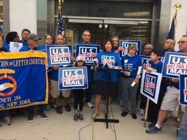 Meng joins postal workers to protest Trump’s proposal to privatize USPS