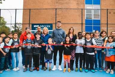 Flushing school celebrates new soccer pitch