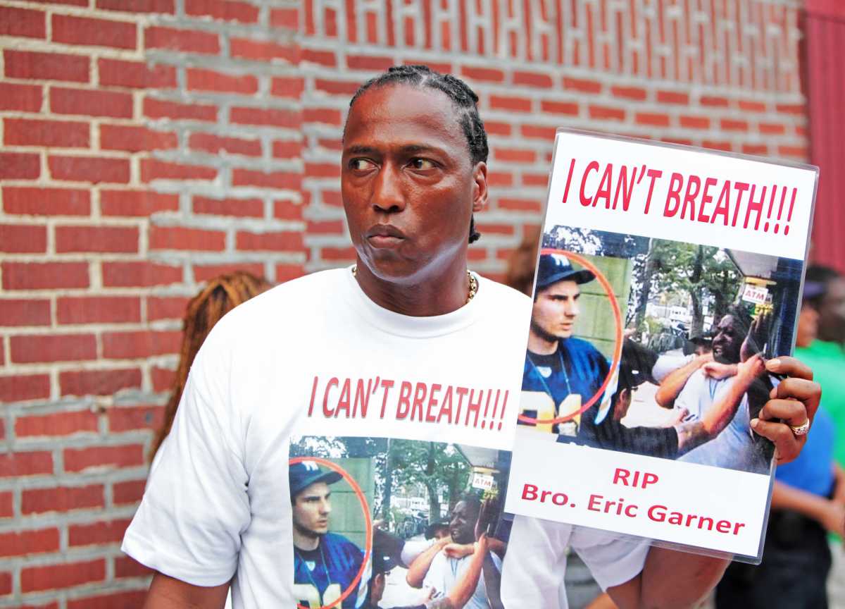 An activist at the July 2014 funeral of Eric Garner on Staten Island.