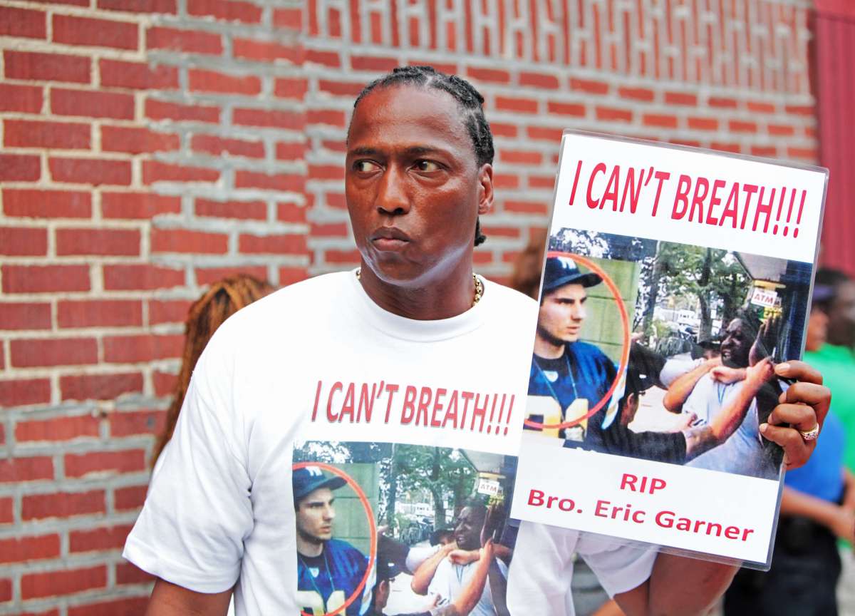 An activist at the July 2014 funeral of Eric Garner on Staten Island.