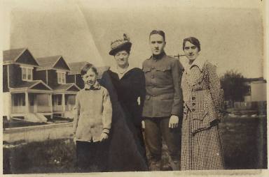 A family in Woodhaven poses with their loved one before he ships off to war.