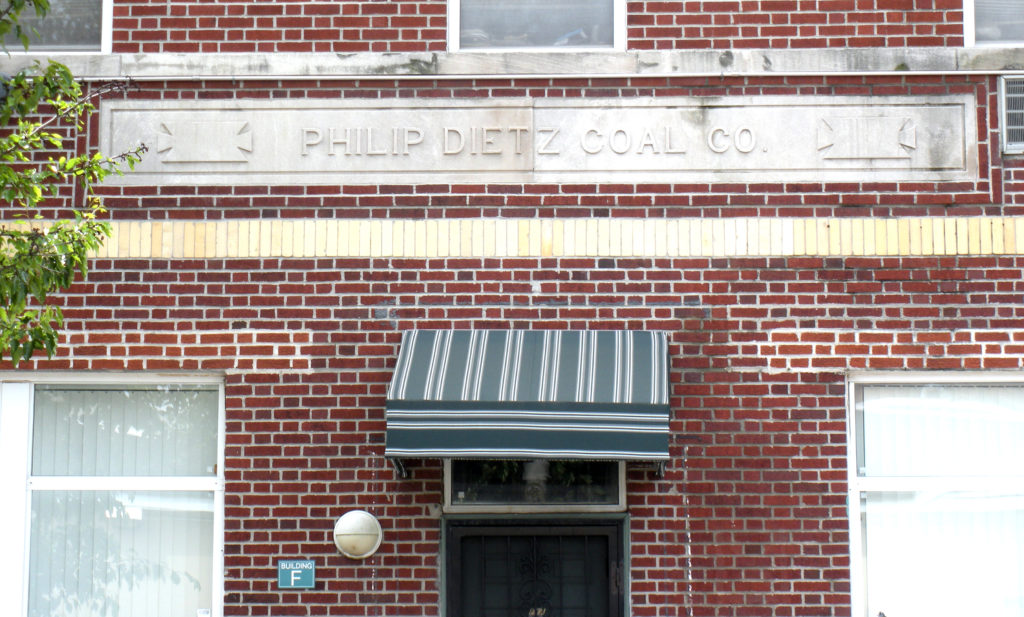 The name of the Philip Dietz Coal Co. remains etched above one of the condominium buildings at Glenridge Mews (RIDGEWOOD TIMES/File photo)
