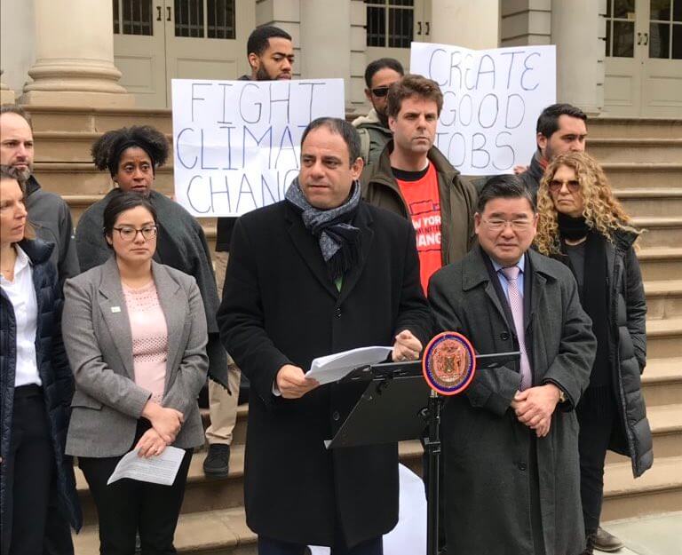 City Councilman Costa Constantinides calls for greenhouse gas legislation at City Hall on Nov. 20.