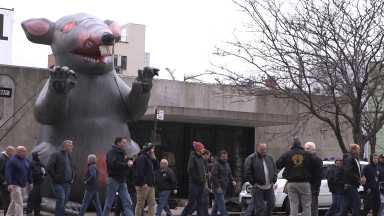 Union members protest outside of MoMA PS1 in Long Island City demanding a fair contract with museum management.