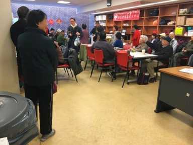 Queens leaders give away turkeys at Flushing senior center