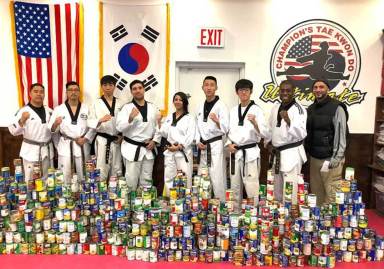 Queens martial artists kick down hunger with food drive to help local charity
