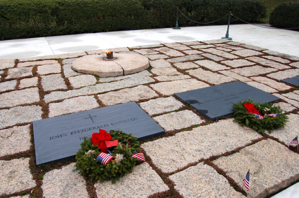 The graveside of President John F. Kennedy at Arlington National Cemetery. His widow, Jacqueline Kennedy Onassis, would be interred at his side following her death in 1994.