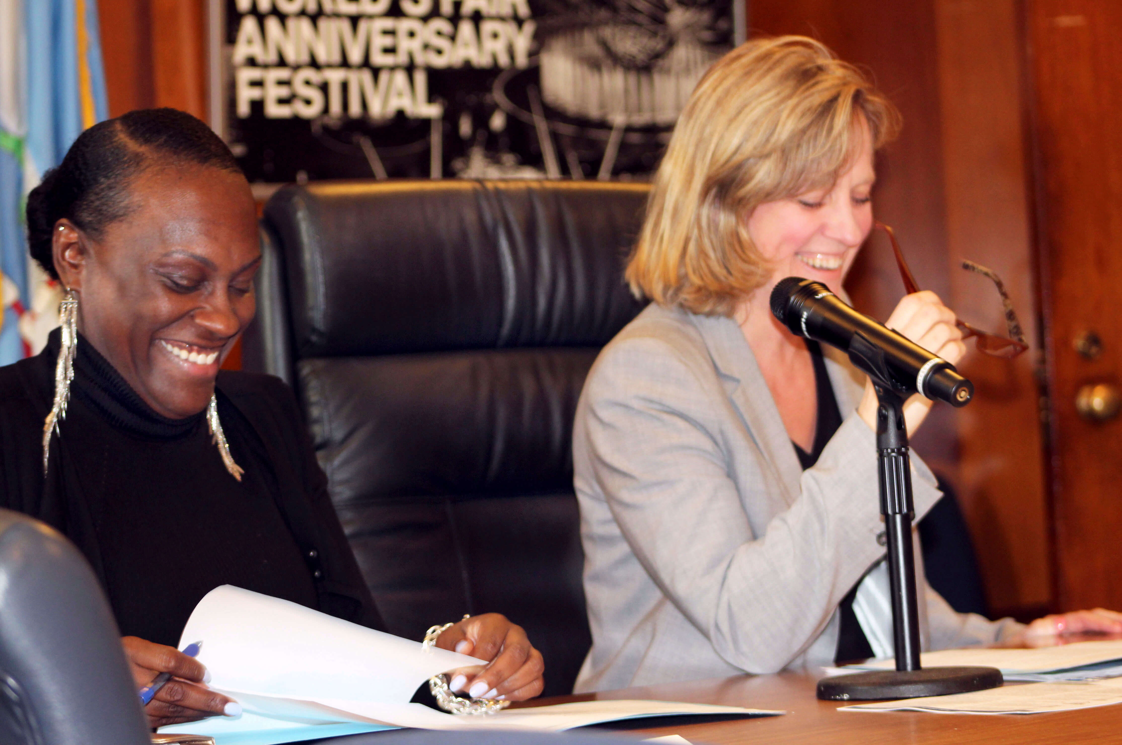Melva Miller (left) with Queens Borough President Melinda Katz during a lighter moment at a 2017 Queens Borough Hall meeting.