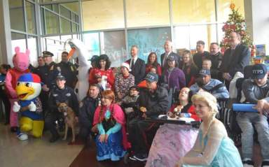 Police Commissioner, NYPD spread holiday cheer at St. Mary’s Hospital for Children in Bayside