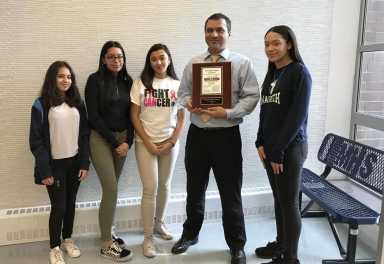 Founding Principal Khurshid Abdul Mutakabbir celebrated eight years in building Maspeth High School into a widely recognized institution.