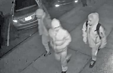 The three suspects behind a Christmas night robbery of a deliveryman in Forest Hills.