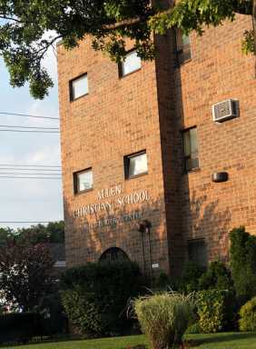 Comrie criticizes DOE for moving schools