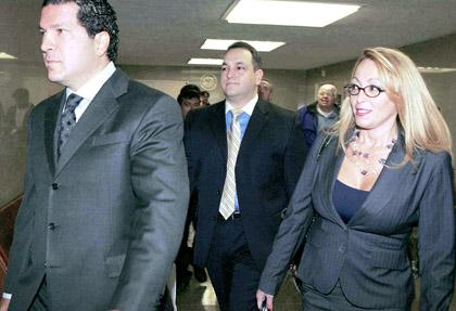 Judge drops two charges in Monserrate slash trial