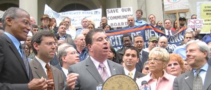 Marshall opposes cuts to community boards