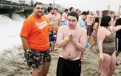 Swimmers hit Rockaway Beach to fight cystic fibrosis
