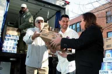 Met visits pantry with food to give