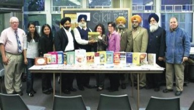 Sikhs donate materials to libraries in Astoria, Laurelton