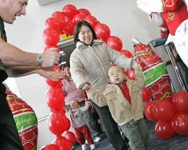 Schneider kids ride jet to meet Santa