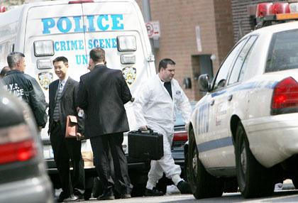 Sunnyside crime lab tech slain in bed: Police