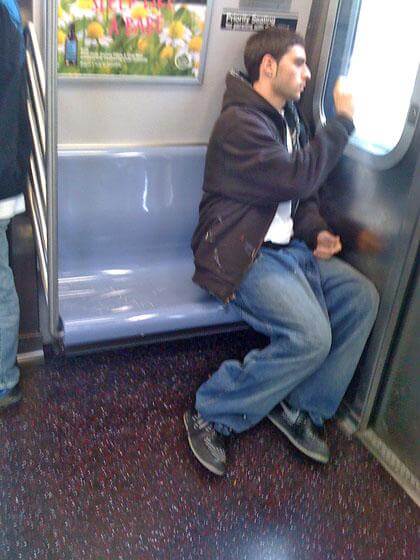 Astoria man vandalized seat, window on N train: Brown
