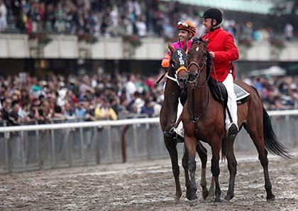 ‘Ruler on Ice’ cuts through rain to win Belmont Stakes
